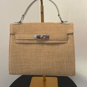 Elegant Tan Handbag with Floral Scarf